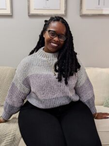 Professional headshot of Essie Bent, LPC-R, resident in counseling. Specialist in therapy for LGBTQ+ and BIPOC communities. Virtual therapy in Virginia.