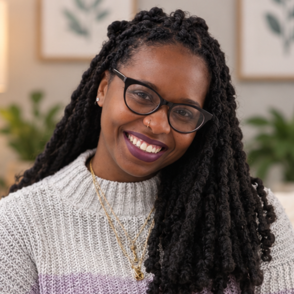 Professional headshot of Essie Bent, LPC-R, resident in counseling. Specialist in therapy for LGBTQ+ and BIPOC communities. Virtual therapy in Virginia.