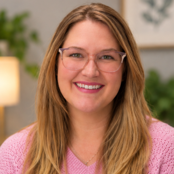 Kaitlyn Steel, LMFT Virginia Couples Therapist smiles to the camera in a professional headshot. Emotionally Focused Couples Therapy Certified Therapist. Clinical supervisor for residents in marriage and family therapy and residents in counseling.