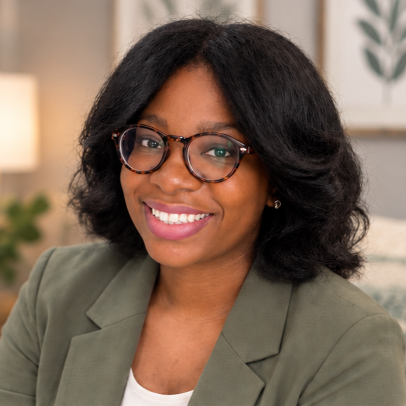 Professional headshot of Morgan Scribner, LMFT-R, resident in marriage & family therapy. Specialist in therapy for couples and families. In-person in-office therapy in Burke, Fairfax Station, Virginia.